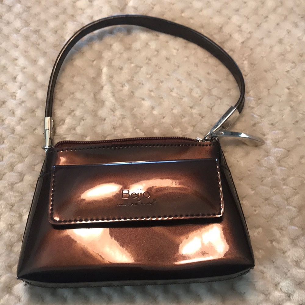 Like New. Small wristlet purse.